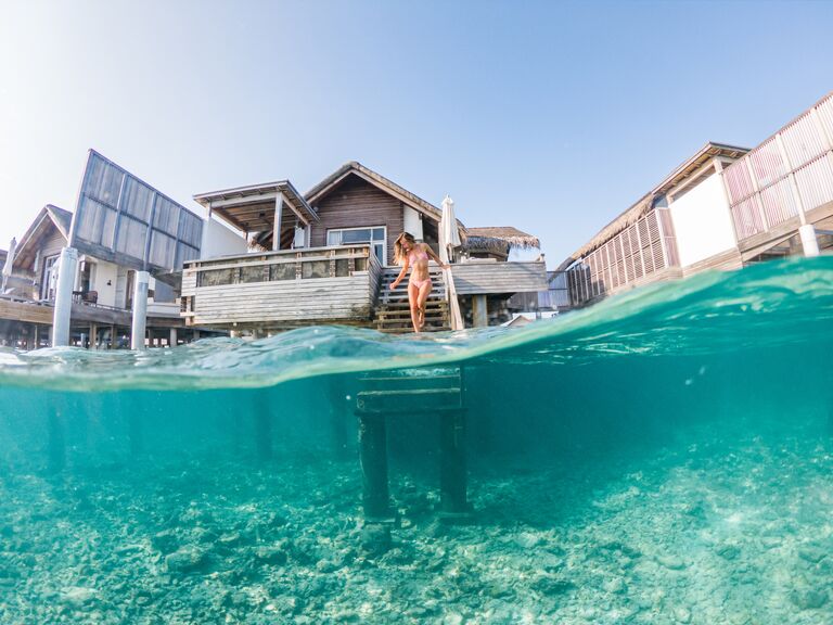 Venturing into the crystal clear water in the Maldives