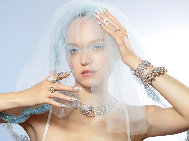 Woman wearing veil and accessories, the knot magazine summer 2025 issue