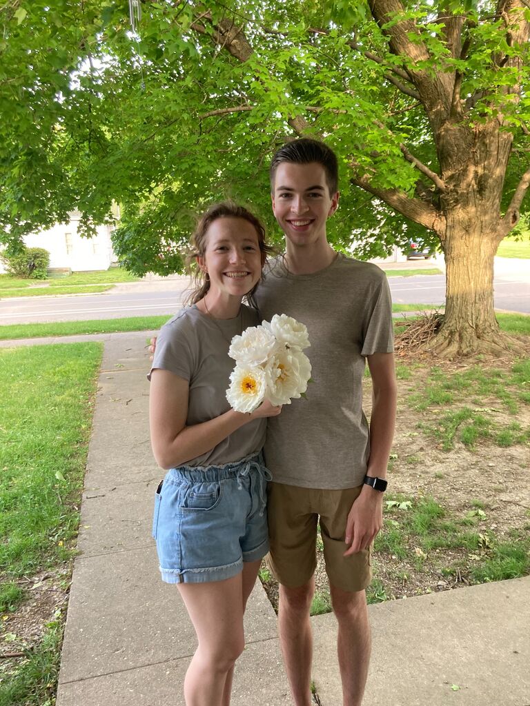 The first time John ever got flowers for Isabel. They were peonies from his driveway.