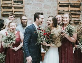 wedding couple with wedding party in snow