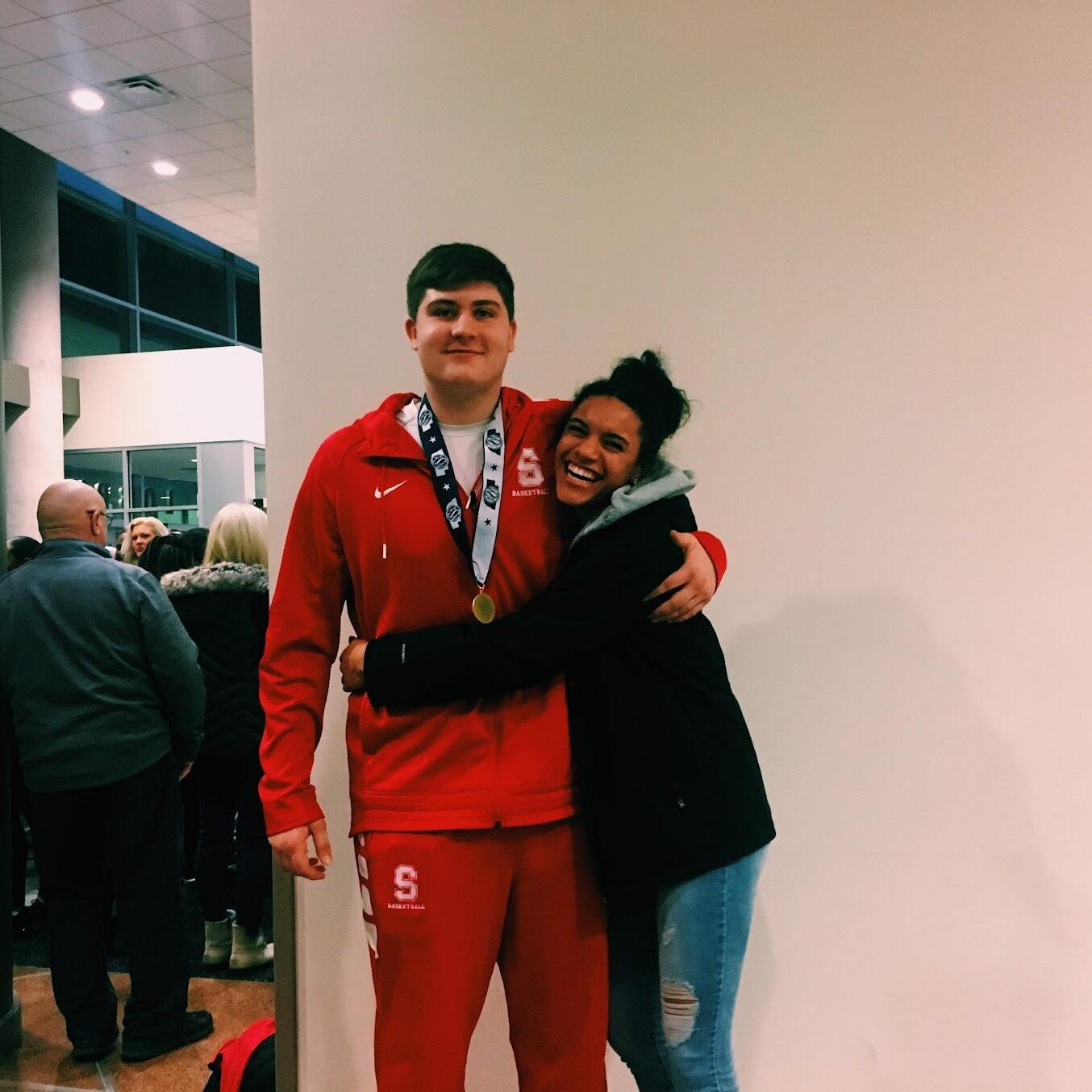 Griffin wins the State basketball Championship... with Macy in tow!