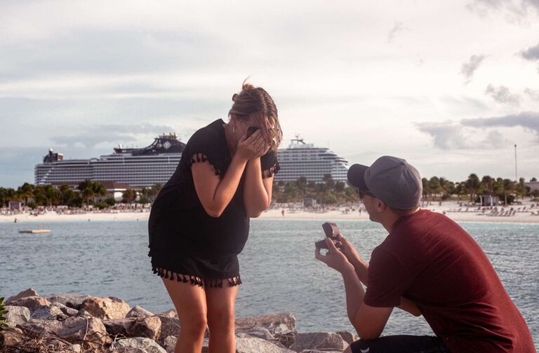 Karly and Tyler love to travel! As they packed for their cruise to the Bahamas, Karly had no idea what Tyler had snuck into his suitcase. While on the last stop of their cruise, Tyler decided to get on one knee and ask Karly to marry him. Karly, with no hesitation, said YES and sobbed for a lot longer than Tyler expected.