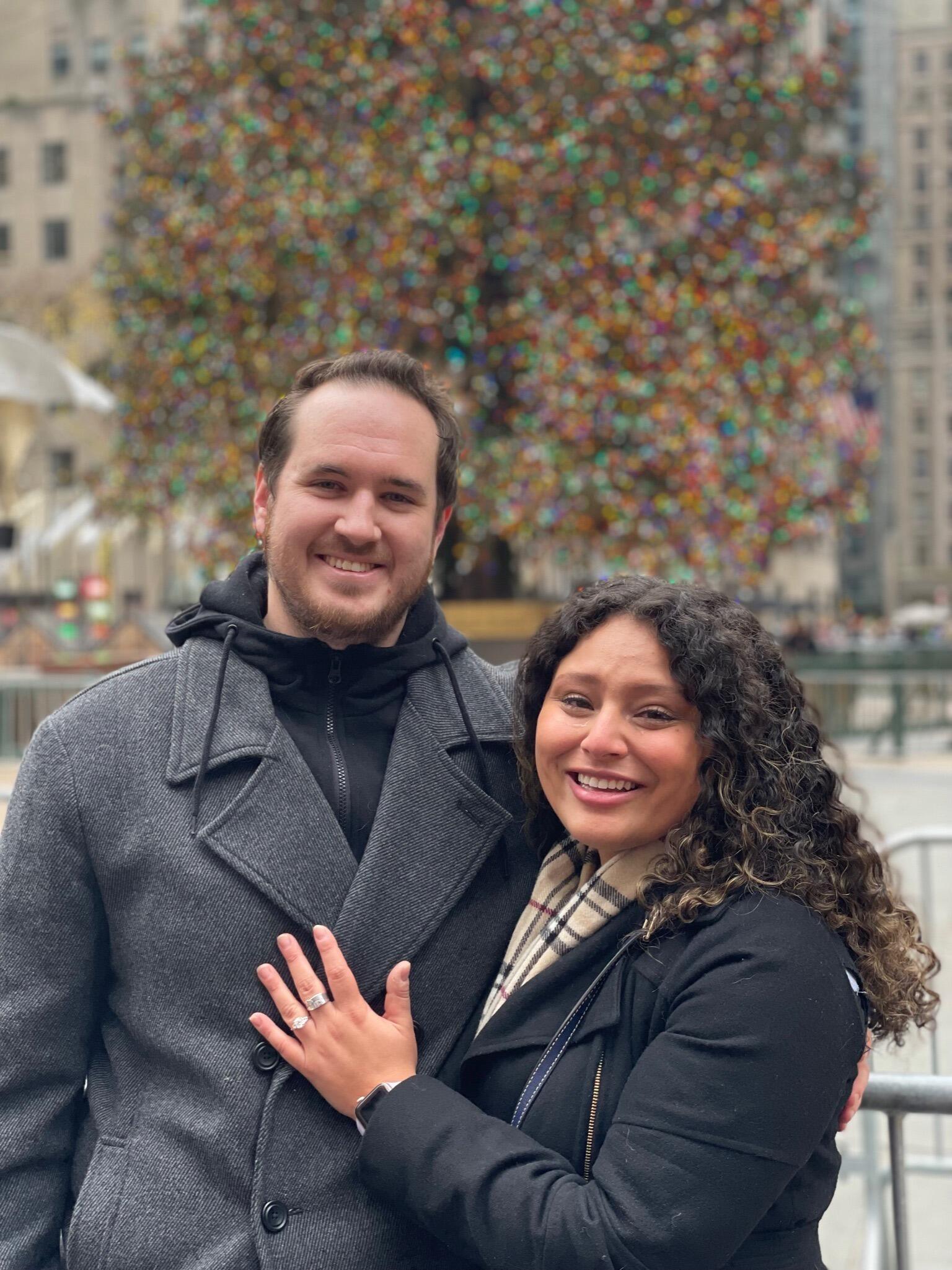 Engaged in front of the Rockefeller Tree!