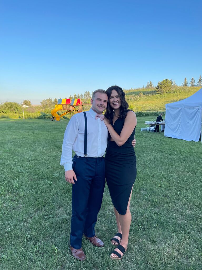 On her second visit to North Dakota that summer, she attended her first wedding as Derek's date. The first of MANY wedding dates they would have together. 