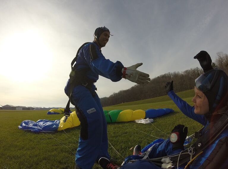 After jumping out of an airplane in Harrisonburg, VA. We've always loved an adventure! 
