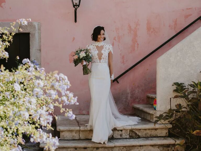Photo of bride holding bouquet on steps