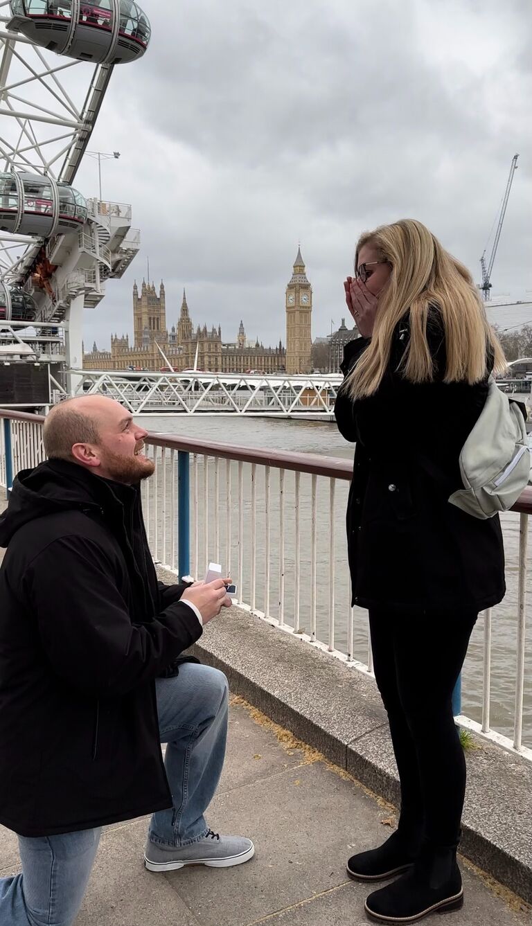 WE'RE ENGAGED!!

While we were walking to ride the London Eye, Al stopped a random couple and asked them to take a picture of us. He actually had them take a video. Big Ben and Parliament were in the background along with the London Eye and someone was playing music on a guitar. He got down on a knee and asked me to marry him.