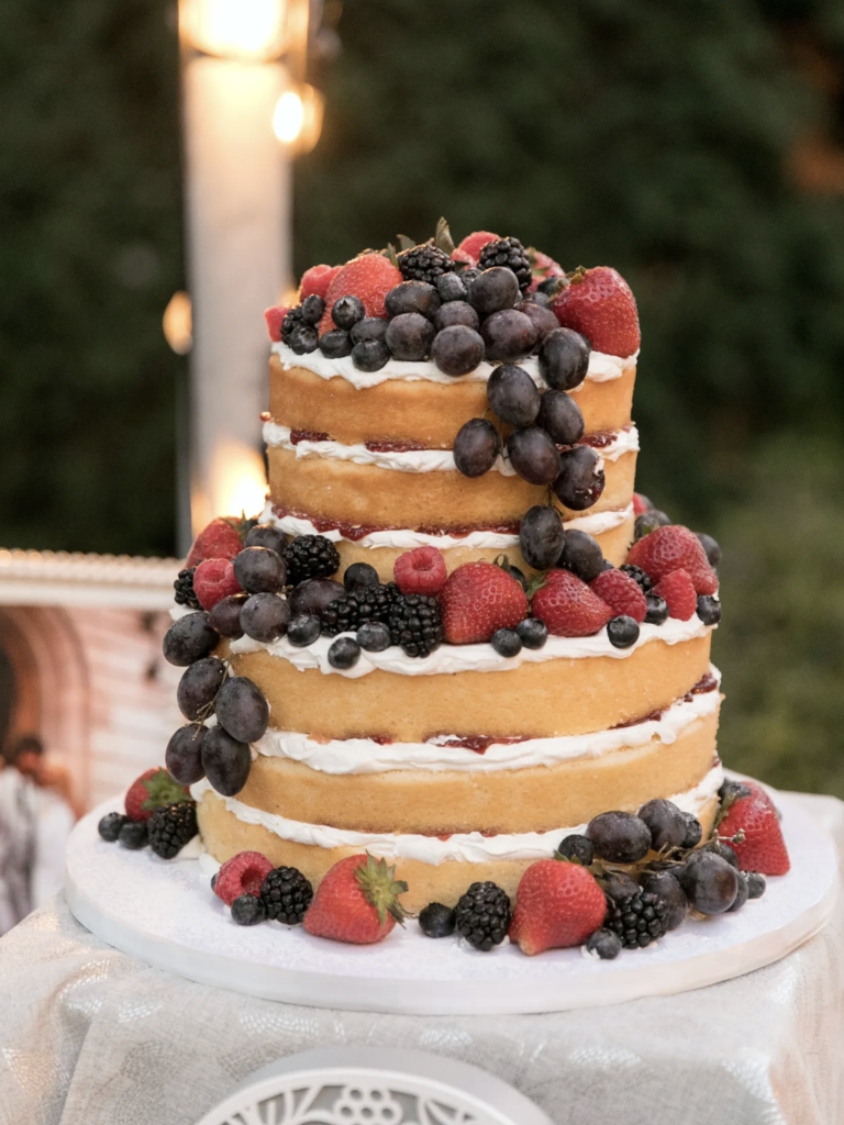 Naked Wedding Cake Decorated With Fresh Berries