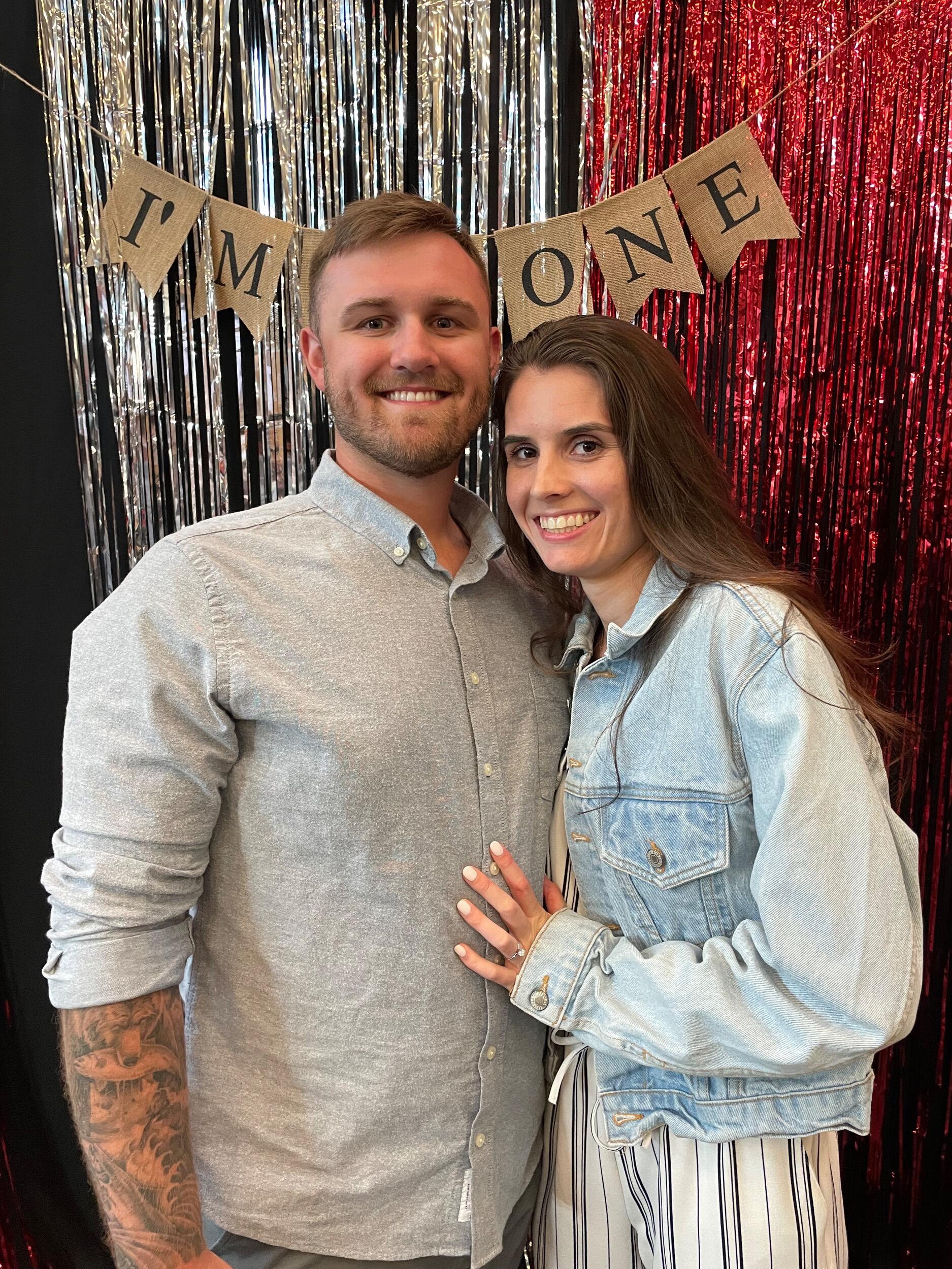 Lizzie supporting Travis at his Nursing school graduation. 