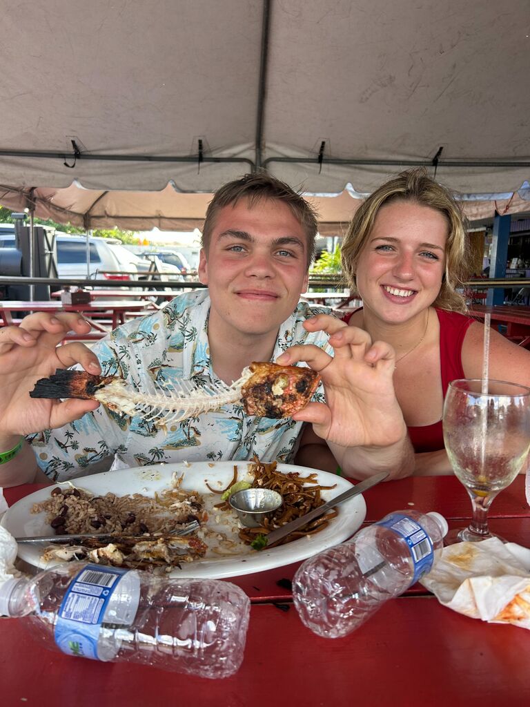 Eating a red snapper on vacation