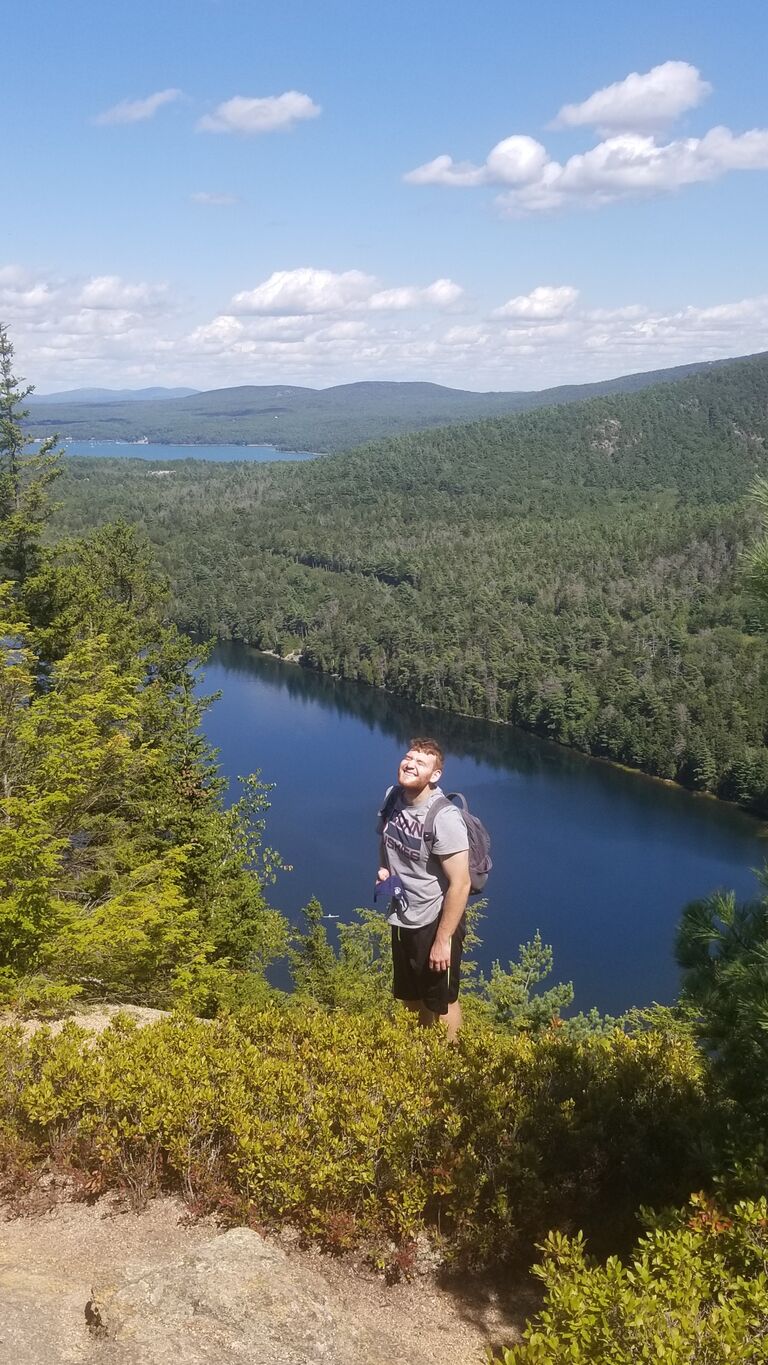 Our first trip together as a couple. This visit to Acadia National Park kickstarted our plan to visit all of the U.S. National Parks. In this photo Nate just found out that he can find some leftover wild blueberries on the trail to snack on.