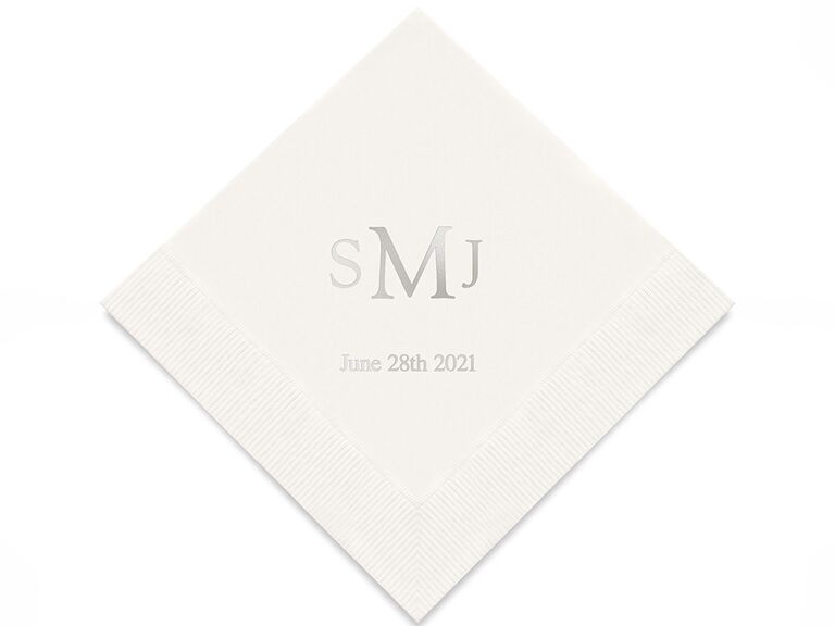 White napkin with monogram and date in silver foil type