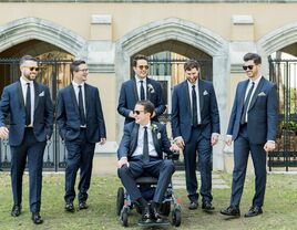 groom and groomsmen in navy suits