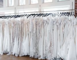 Rack of white wedding dresses from Wedding Angels Bridal Boutique in Atlanta