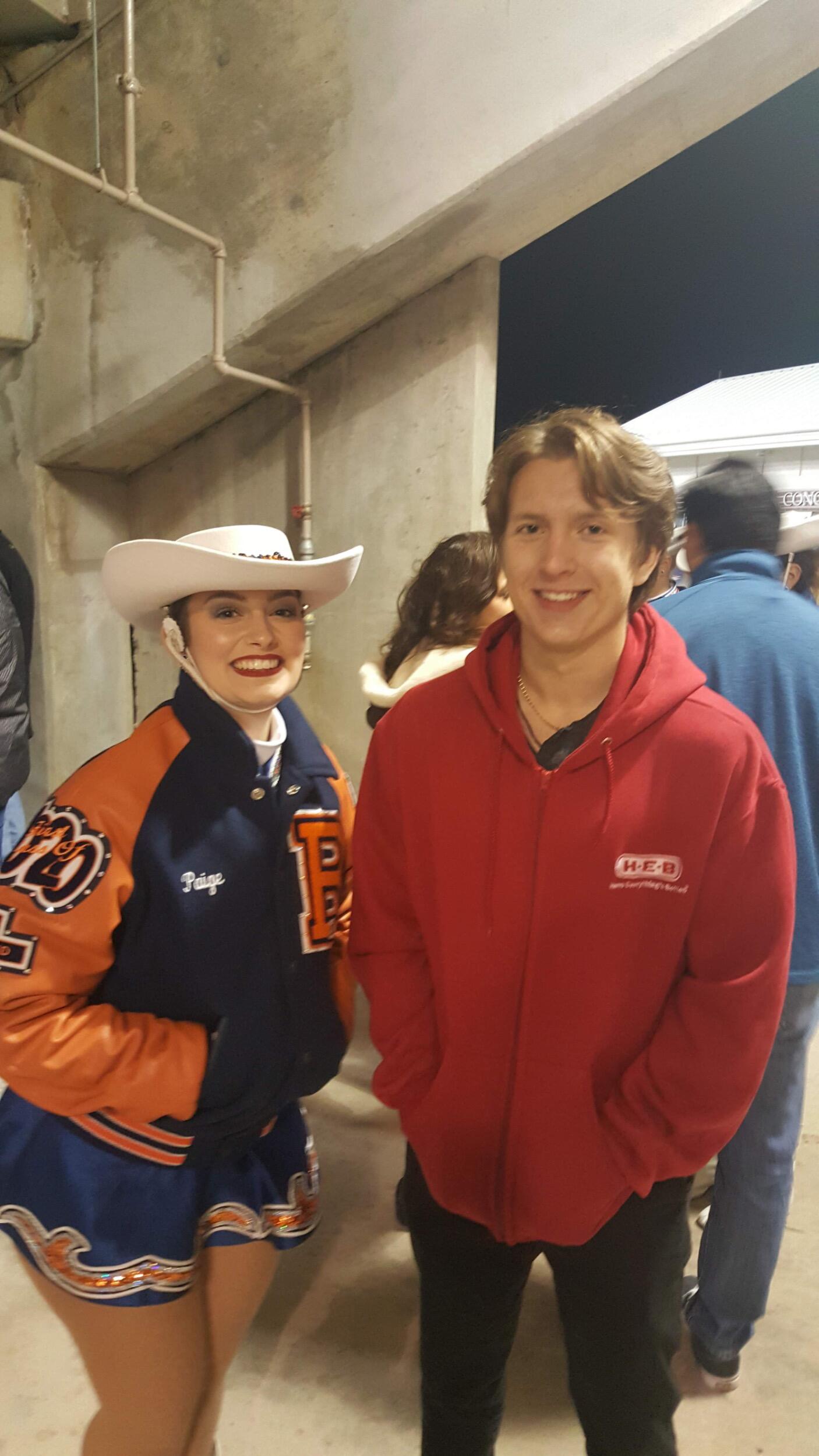 Cole watches Paige perform at every halftime show.