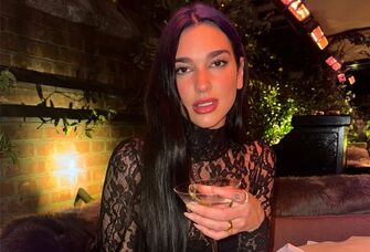 Dua Lipa wearing an engagement ring from Callum Turner