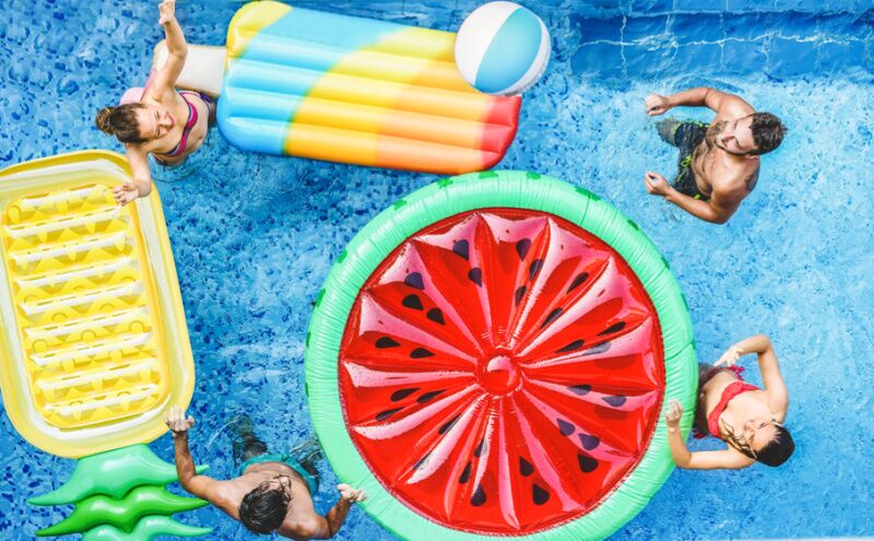 Fun pool floats graduation pool party idea