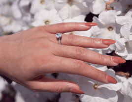 Nude nail polish with silver engagement ring