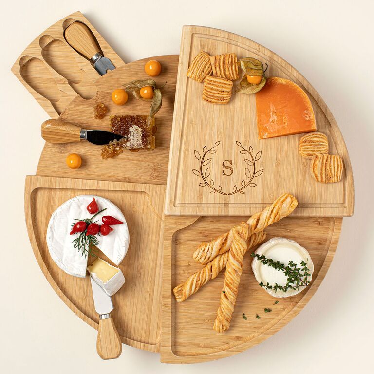 Swivel wooden cheese board engraved with initials 30-year anniversary gift