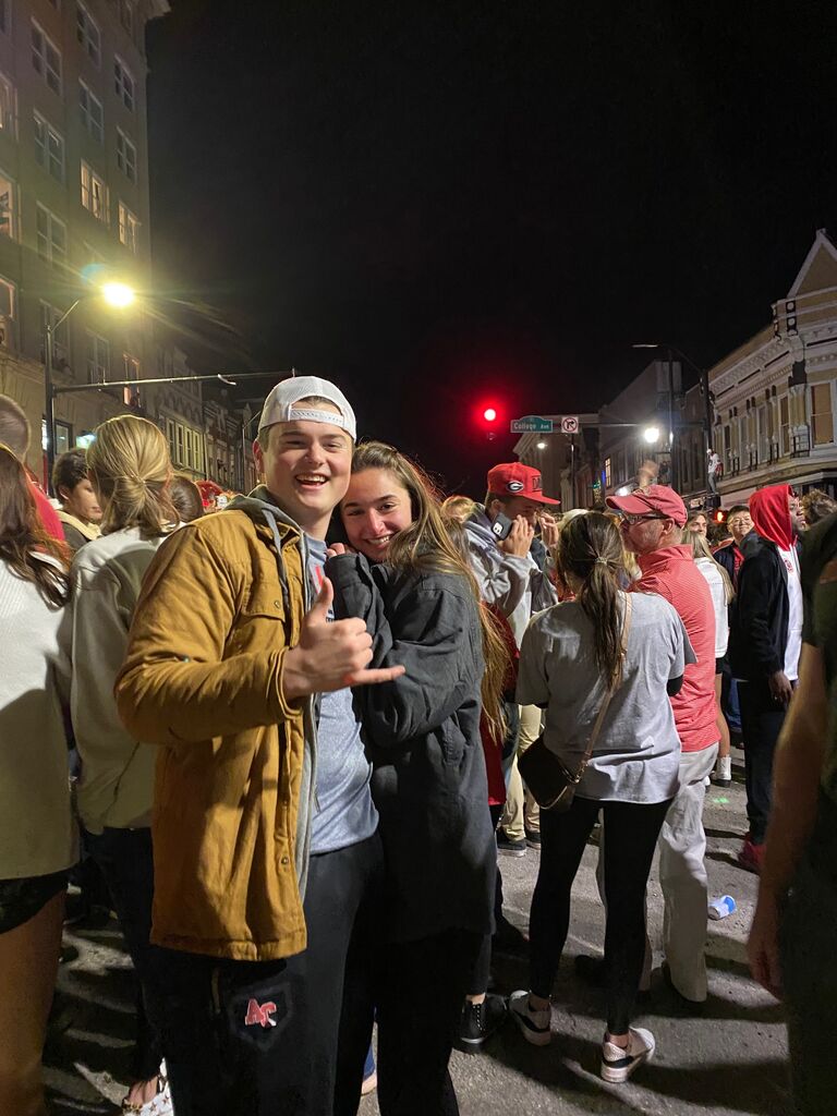 Us amidst the madness of downtown Athens after the Georgia Bulldogs won the National Championship!