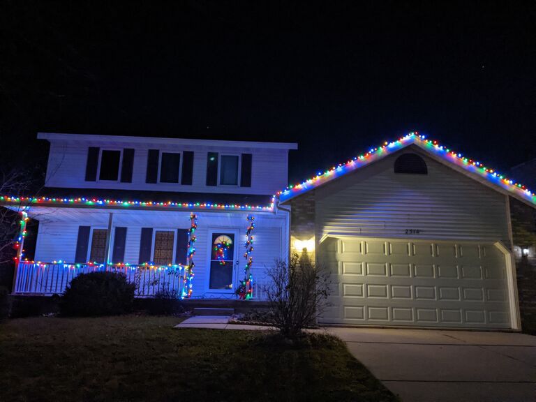 Zac gets his way with colorful lights outside the house but Emma rules the rest of the house decorations with an iron fist