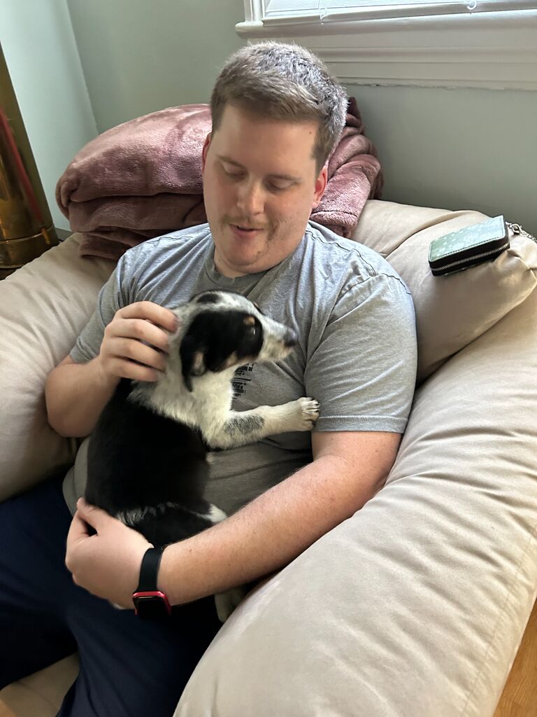 Dilly's first day at home. Daddy's girl since day 1!