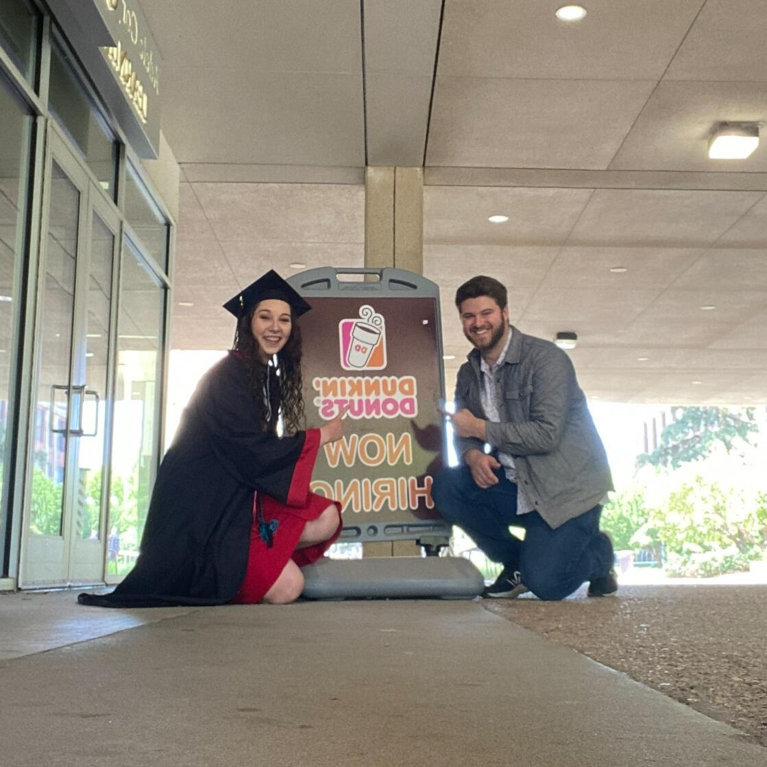 Before the two officially left the University of Nebraska-Lincoln, they wanted to take a commemorative photo of the place they had their first date together. Their first date was catching up together over coffee at the Dunkin Donuts inside UNL's Love Library.