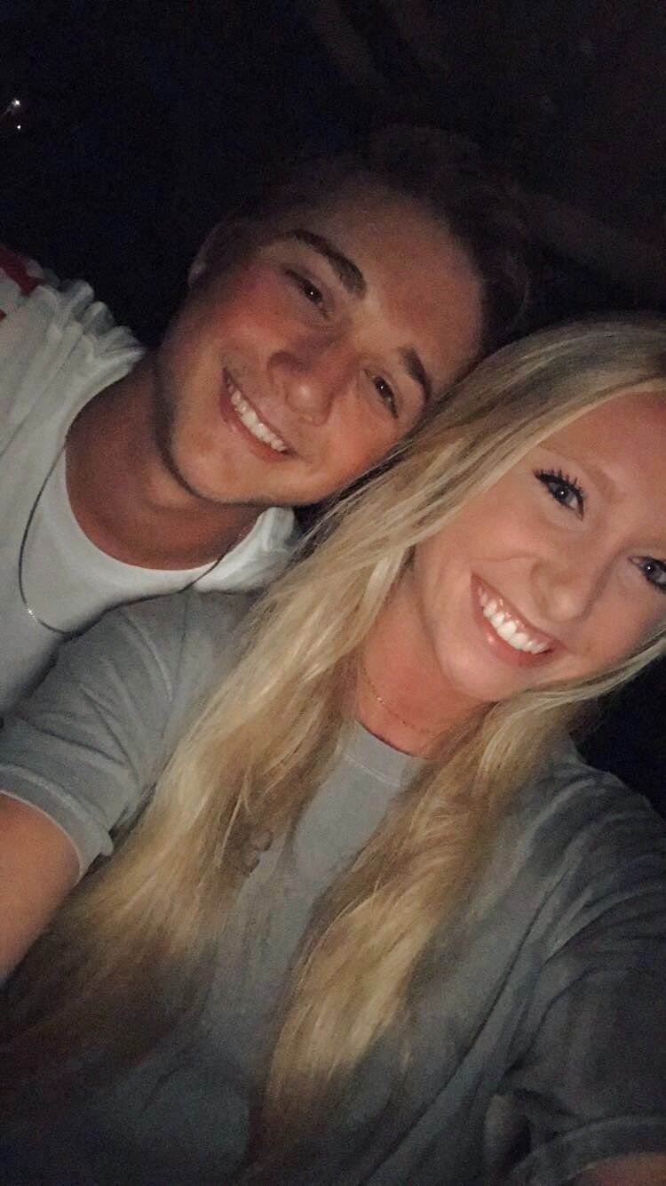 Our first date and first picture together! Summer of '17 I, Hollis, worked as a lifeguard at the Centennial Valley Country Club and Michael worked as a cart boy for the golf course. Michael would always drive by and wave at me, eventually asking me on a date. The night of the county club fireworks he picked me up on his golf cart and we road around for hours, watching the fireworks and talking all night. 