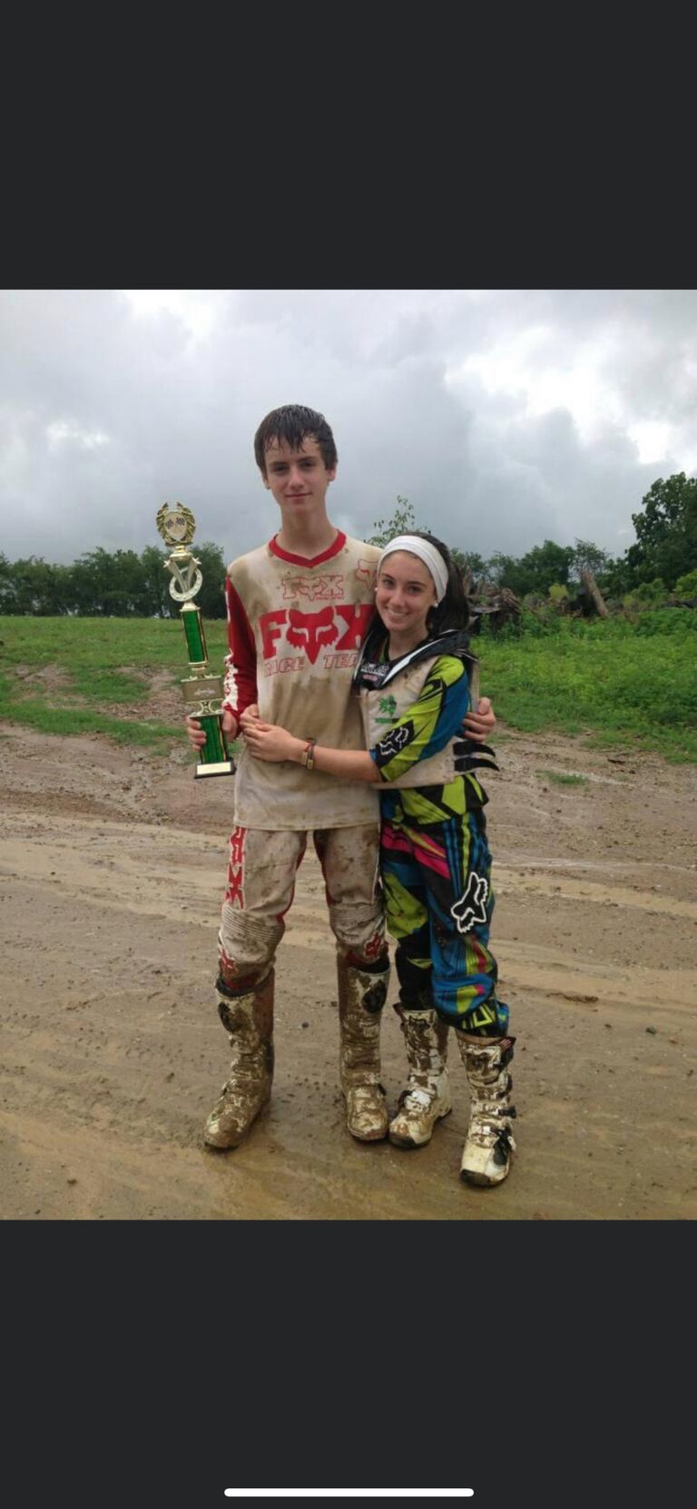 Our very first picture together while "dating" in our early teen years. We had both just finished muddy races. 