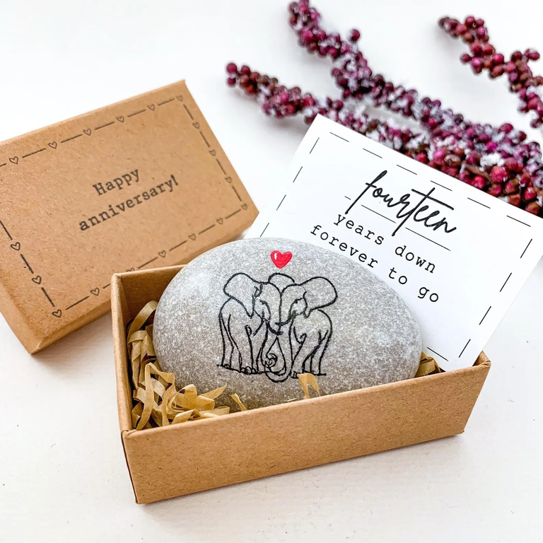 Handpainted stone with two elephants under a heart 
