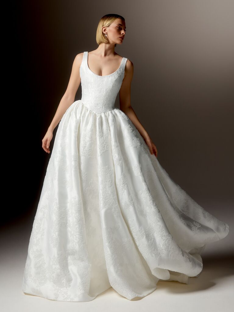 Floral brocade ball gown with subtle basque waist skirt and scoop neckline by Justin Alexander