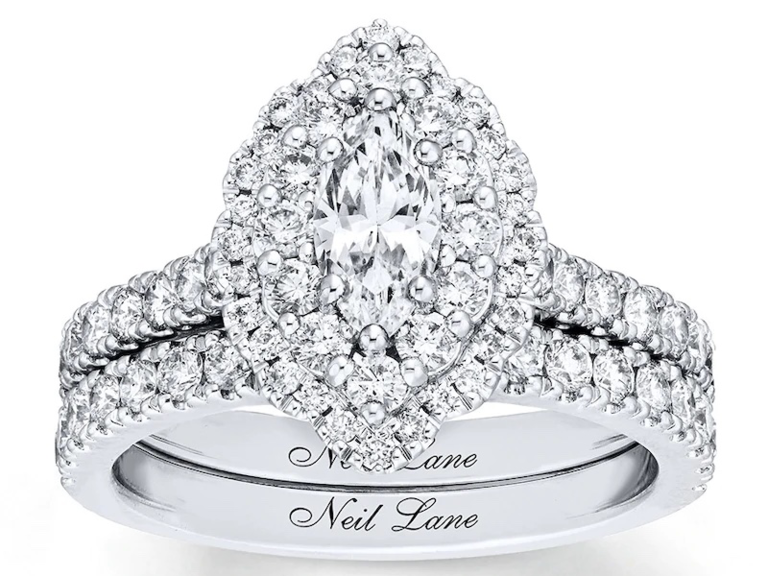 Marquise center diamond with double halo and diamond encrusted bands
