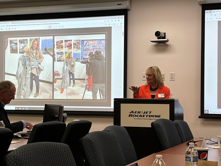 Renee gives a presentation on the underuse of museums and libraries for cost engineers. 