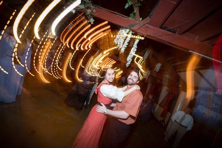 Attending a romantic, renaissance-inspired wedding together!