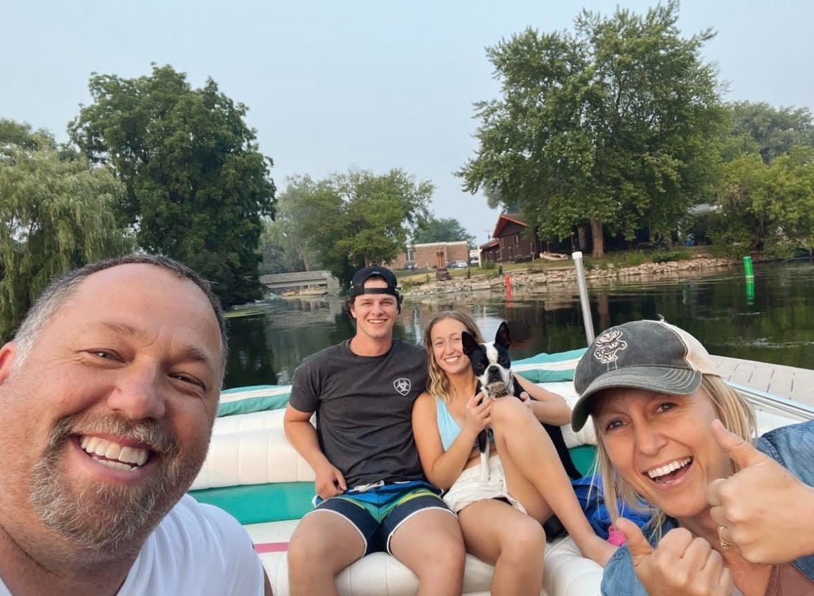 Nick and Hailey (and Pepper, the Miller's dog) with Doug and Monica on Lake Monona.