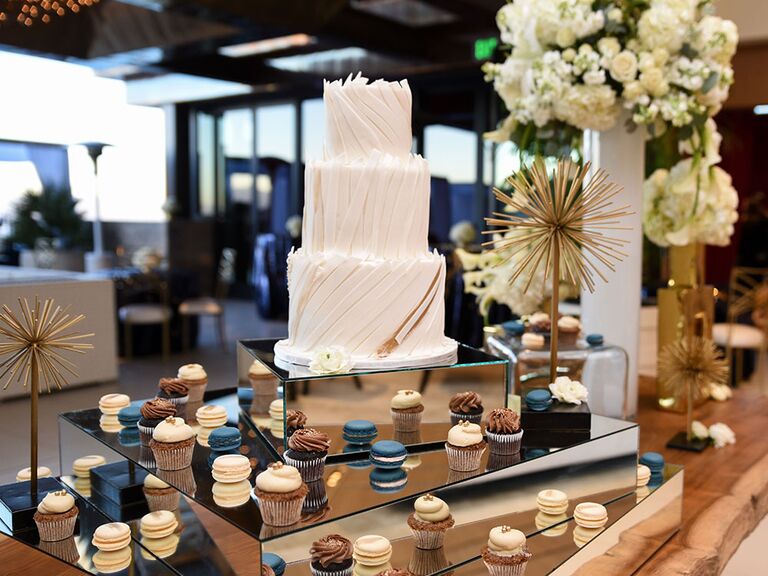 modern mirrored table with macarons for dessert