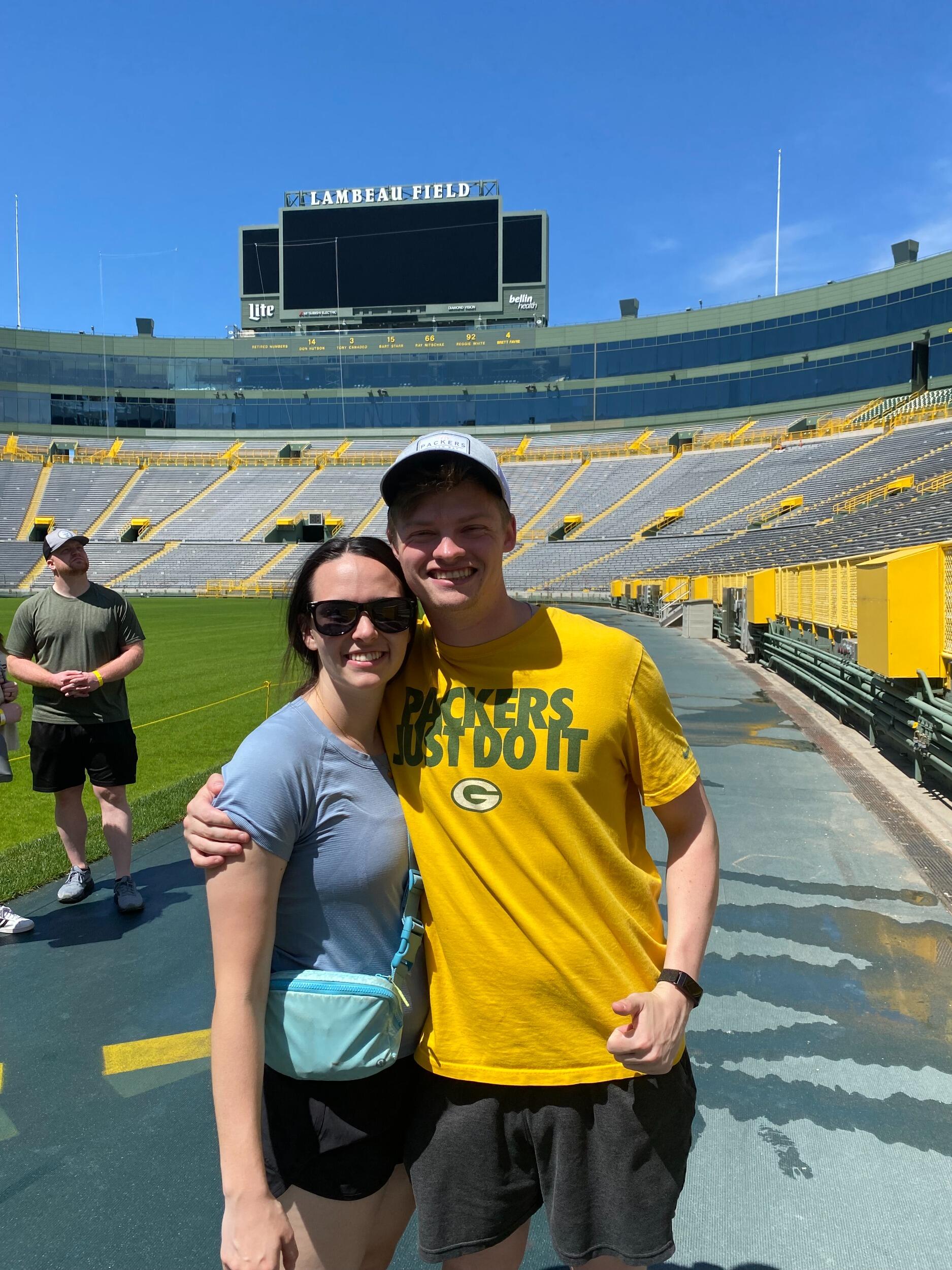 Lambeau Tour. You will notice the smaller scoreboard in the back. Don't be fooled! Jake bought a share in the Packers, as any good fan would do, and was also surprised with another share in the Packers as a present from Katelyn's parents for Christmas. He is a generous owner, who loves to support his team and see the fans of his team enjoy their game day experience with a larger jumbotron. Thanks, Jake!