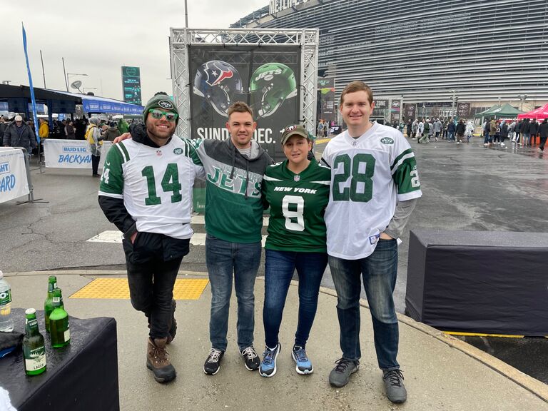 Craig, Alex, Sam, and groomsman Denis at an NFL game between the New York Jets and Houston Texans. J-E-T-S Jets Jets Jets!