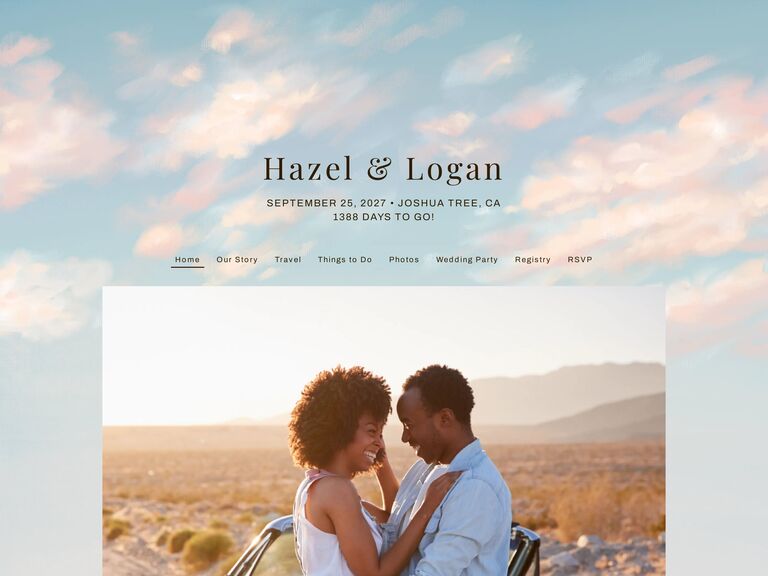 the knot free wedding website example with pink watercolor clouds against blue backdrop 