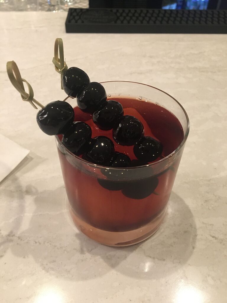 It all started with a drink... Sam walked into Carmel, Indiana's swankiest new hotel bar with her best friend (and future MOH) Sam Duffy. David was the bartender, and after a few rounds of banter Sam ordered a "Manhattan just for the cherries". David clearly thought she was cute from that very first day, as a 10 cherry Manhattan made its way across the bar, and Sam knew who her new favorite bartender in town was. They stayed all night, returned for many more, and became fast friends. Sharing late night stories and quick witted humor across the bar became their routine, and soon it was clear that any free time they had was spent together.