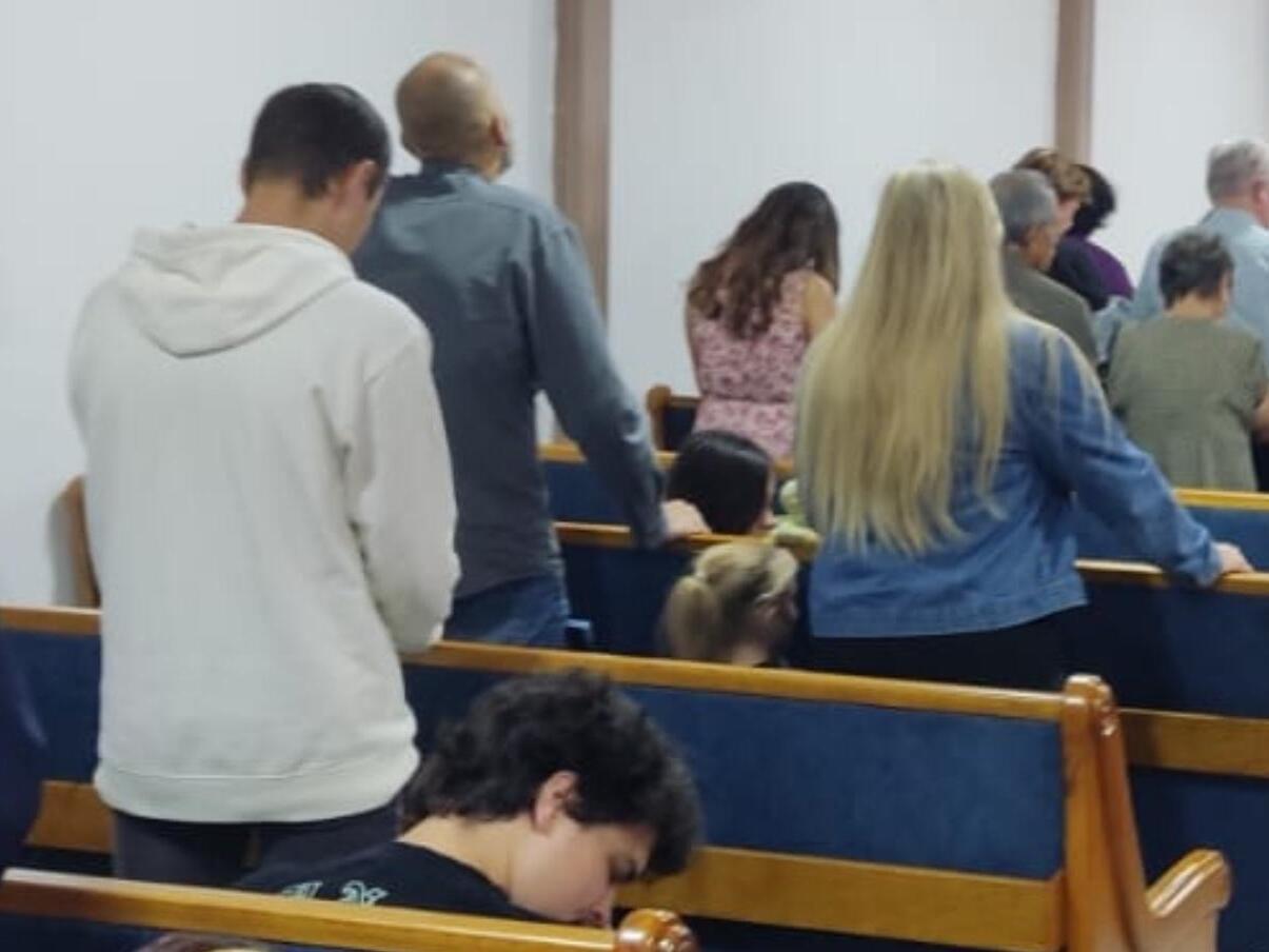 Caleb (in a white hoodie) and Isabella (in a pink dress) met for the first time at their church in Cuenca. It was Isabella's first Sunday attending there. Although their initial conversation was a bit awkward, for Caleb, it was love at first sight. On the other hand, Isabella experienced a slower process; however, she remembers thinking that he was very handsome!