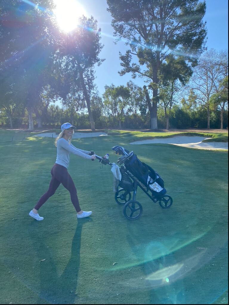 Caddying for Emily's all-time favorite golfer 