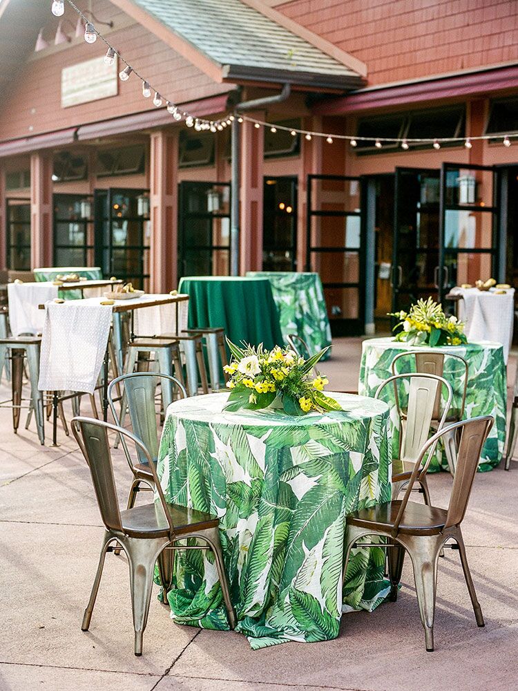 cocktail table with tropical leaf print linen