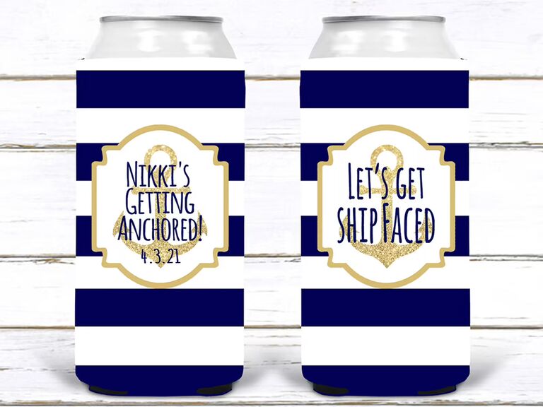 Navy and white striped koozies with gold anchor and pun in center