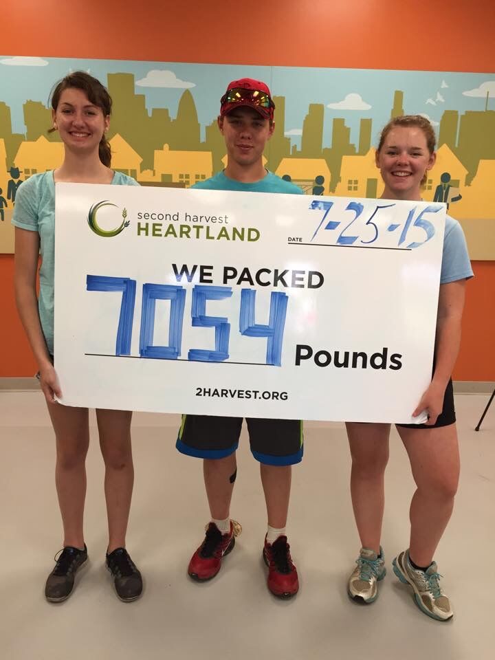 Volunteering packing meals at Second Harvest Heartland