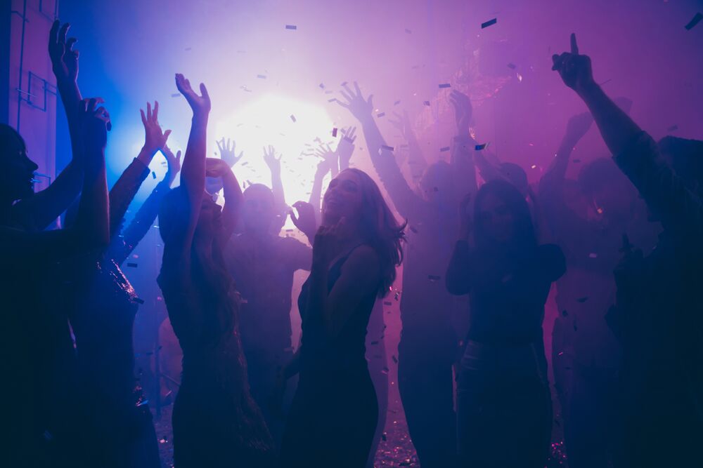 Teens dancing at Euphoria themed party