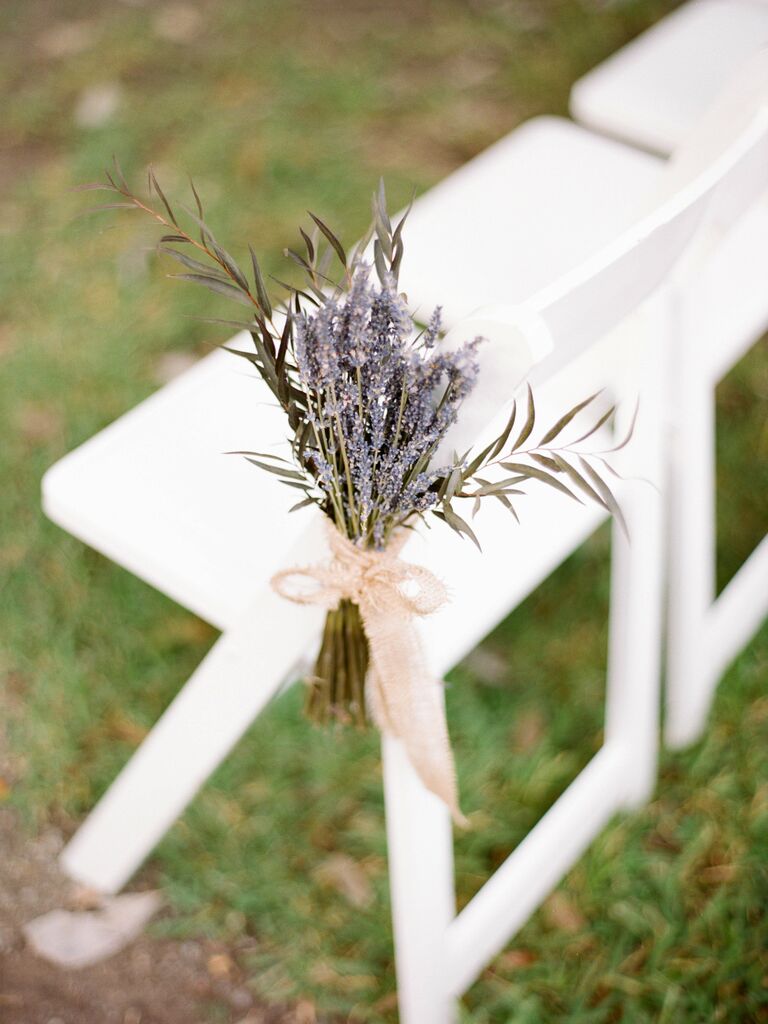 rustic aisle marker for wedding with fresh lavender bundle and greenery tied with burlap ribbon