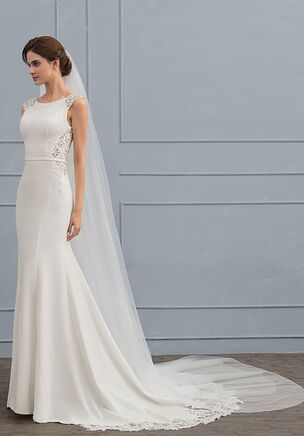 A trumpet court train wedding dress that looks perfect on your amazing and voluptuous figure, while providing comfort on your grand day. With its scoop neckline, this dress made from lace and stretch crepe best describes a modest and a delicate woman.