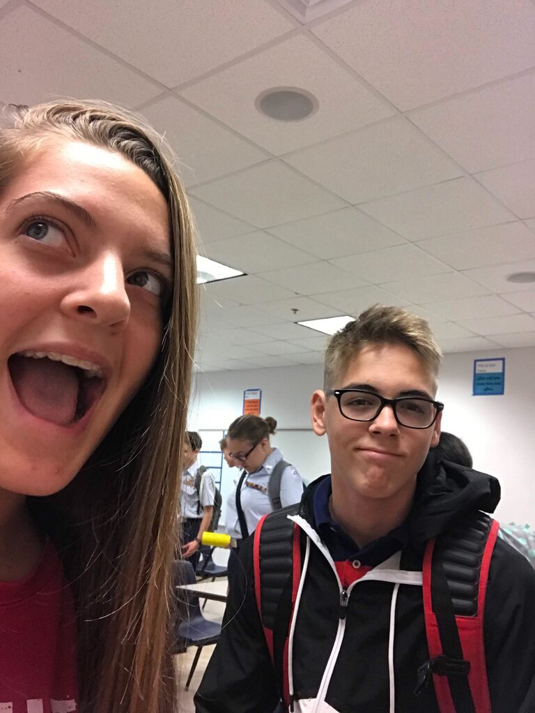 This is our first selfie together! We became friends in pre-calculus our junior year of high school.  We had some mutual friends before that but this was the beginning of our friendship! Aiden would sit behind Caroline during class and ask for her homework! Very noble of him ;) 