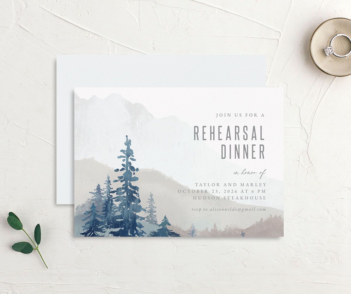 Mountain Canvas Rehearsal Dinner Invitations front-and-back in blue